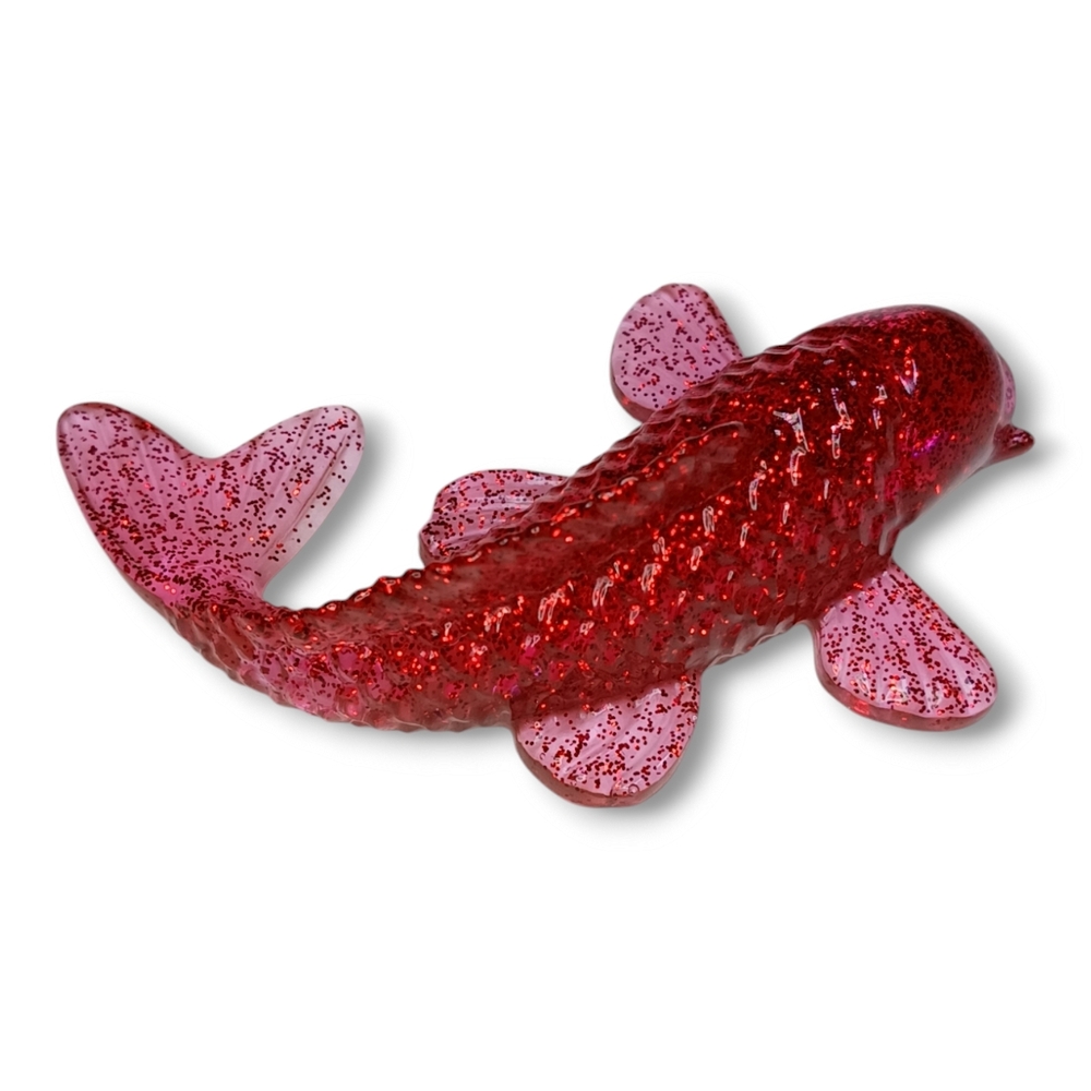 Vibrant Red Decorative Koi Fish Figurine with Textured Scales and Prominent Fins